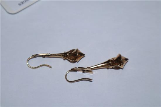 A near pair of ornate 19th century yellow metal drop earrings, 48mm & 52mm.